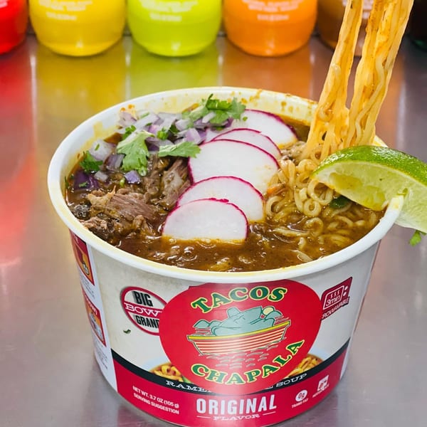 Tacos Chapala ramen soup with beef, radishes, onions, cilantro, and lime in a branded cup.